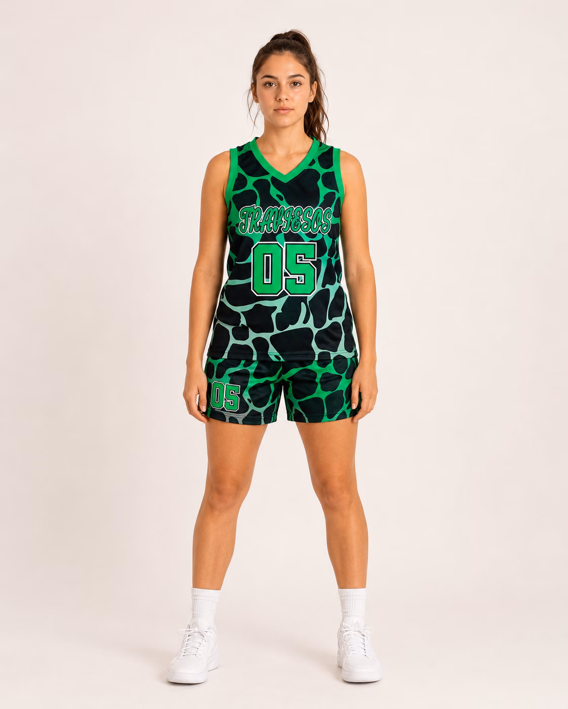 Traviesos green and black basketball uniform front view